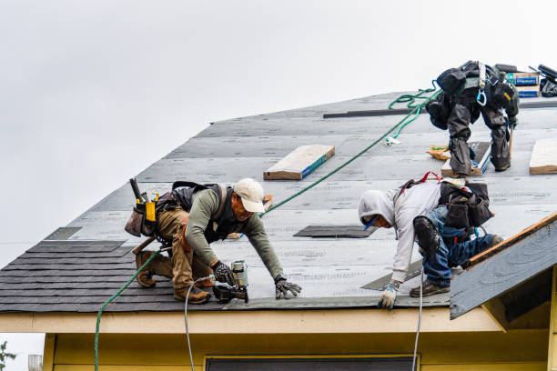 Professional Gutter Installation technician working in Wilmington, MA